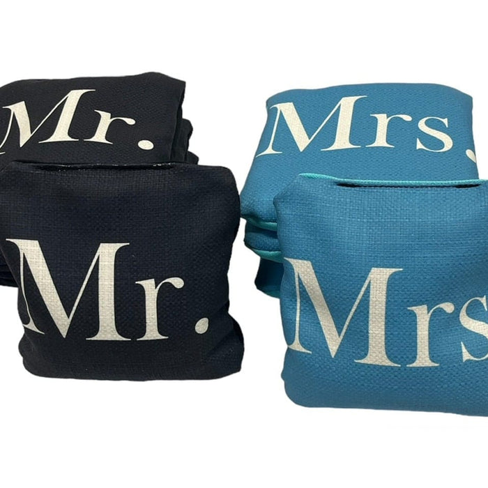 Personalized wedding cornhole bags featuring the couple’s photograph, names, monogram and wedding date
