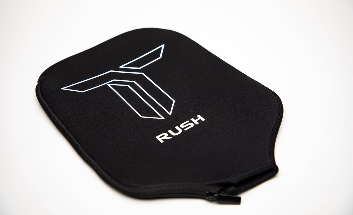 Pickleball Paddle RUSH 13   Includes custom weight card, paddle cover, paddle eraser, and lead weights.