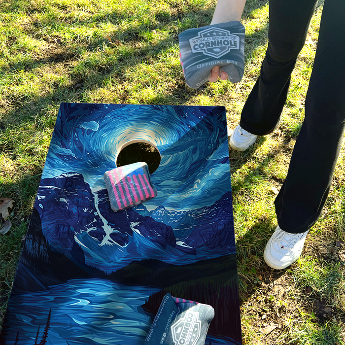 World Series of Cornhole Recreational Cornhole Set - Glacier National Park Nighttime Boards with Red and Royal Blue Bags