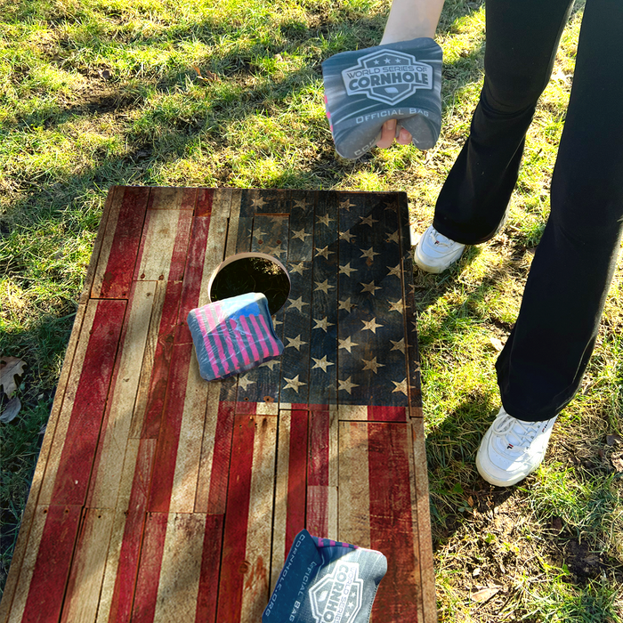World Series of Cornhole Recreational Cornhole Set - Rustic American Flag Boards with Red and Blue Bags